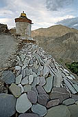 Ladakh - Lamayuru gompa, chortens and mani walls with graved stones 